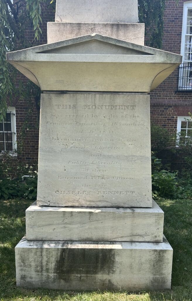 Close-up photograph of the inscription on the Charles Bennett monument in the Christ Church churchyard, noting that the monument was erected by order of Alexandria’s Common Council.